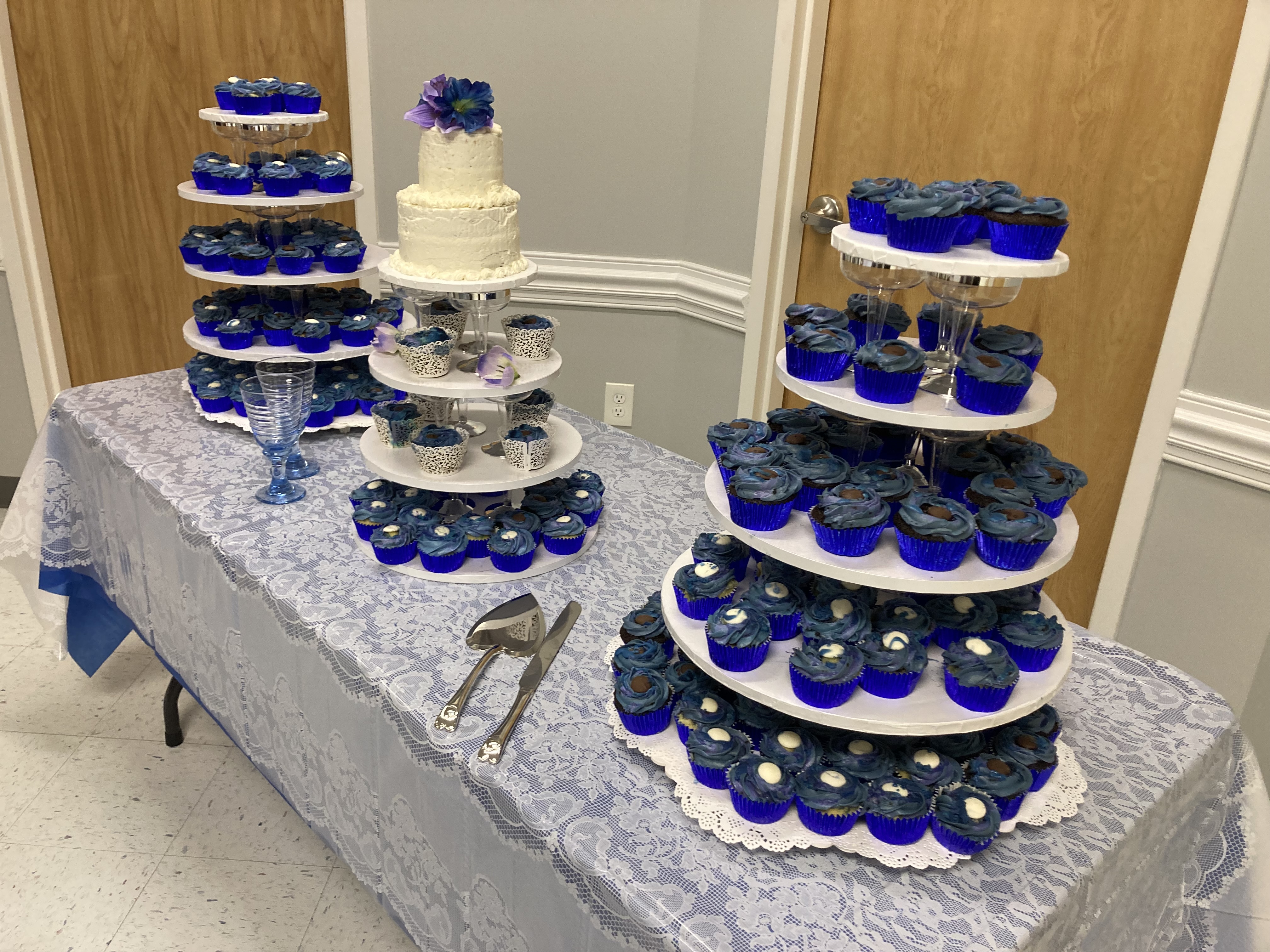 Display of several custom decorated celebration cakes