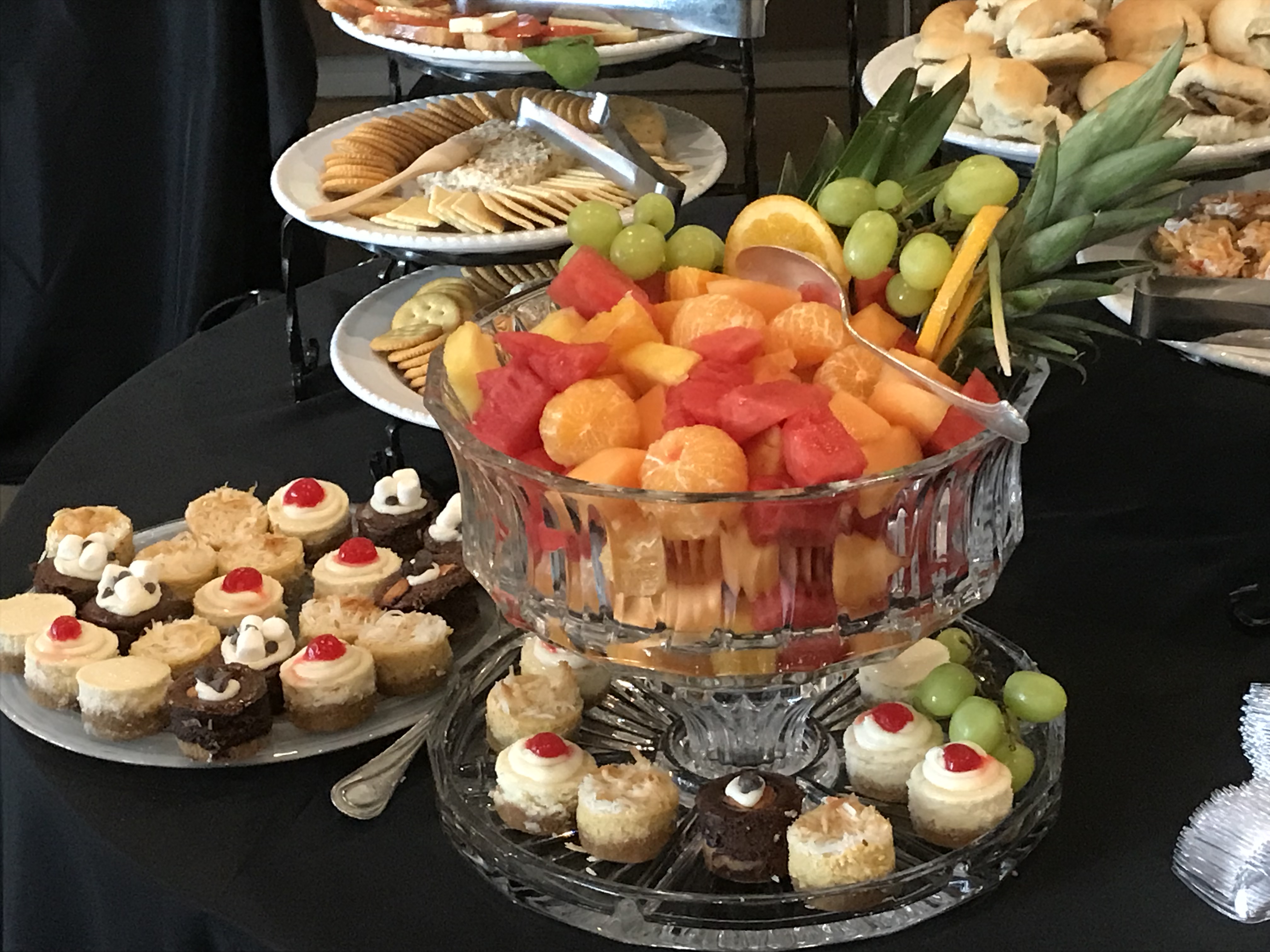 Fresh fruit, desserts, and three-cheese pâté grazing display
