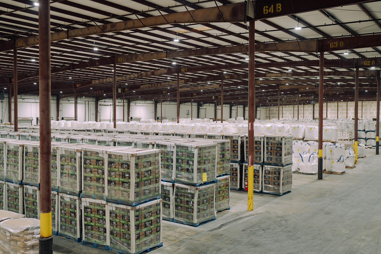 Inventory aisles in the warehouse at TEKPAK's Marion, AL facility