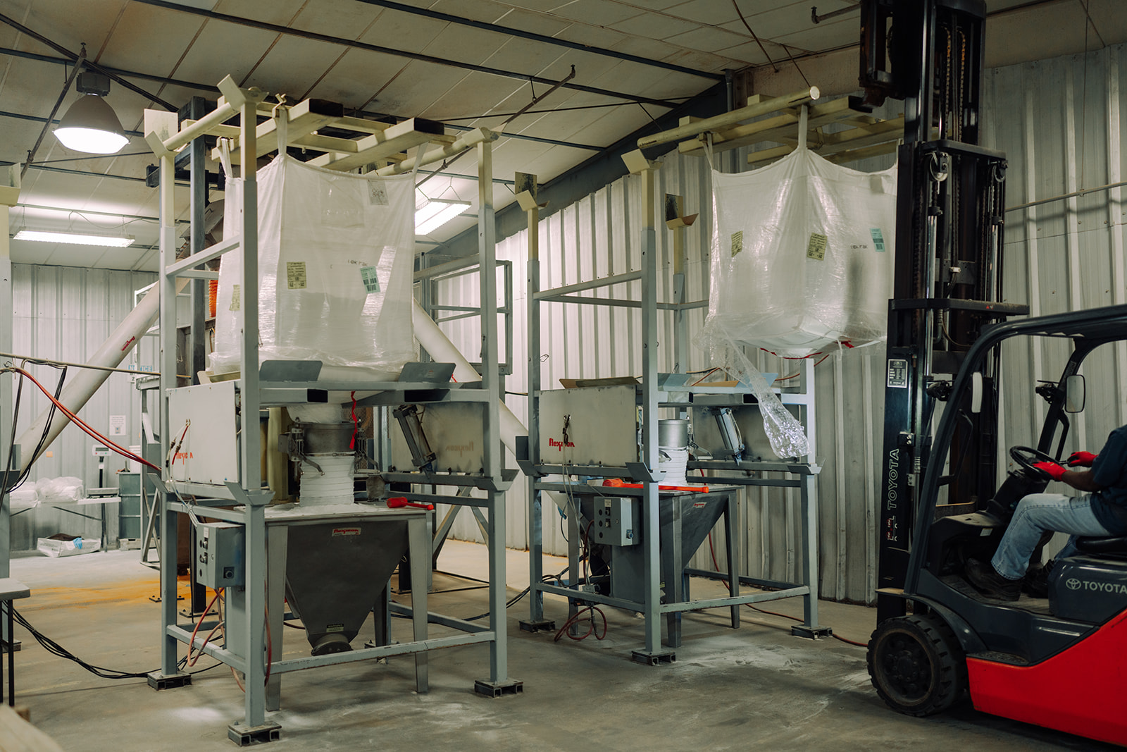 Worker monitoring blending equipment at TEKPAK's Marion, AL facility